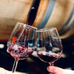 Creek's Edge Winery wine glasses clinking.