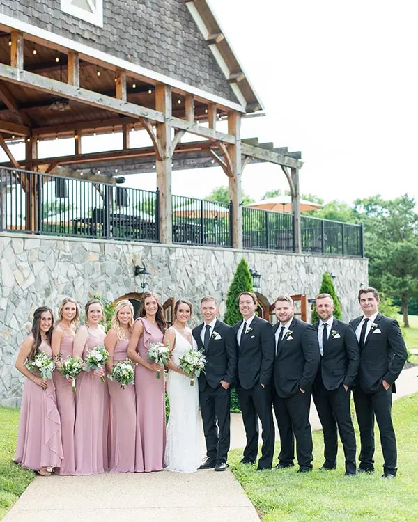 Wedding photos in front of Creek's Edge Winery.