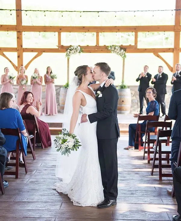 A wedding in the outdoor pavilion at Creek's Edge Winery.