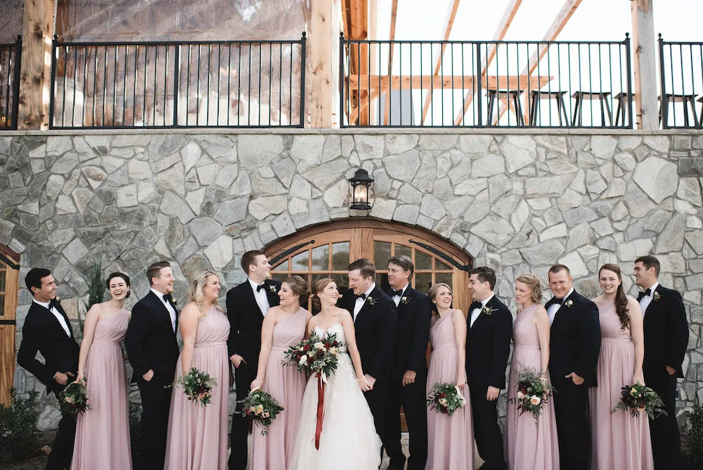 Wedding photos in front of Creek's Edge Winery.