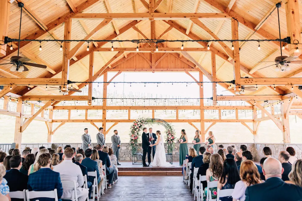 A wedding in the outdoor pavilion at Creek's Edge Winery.