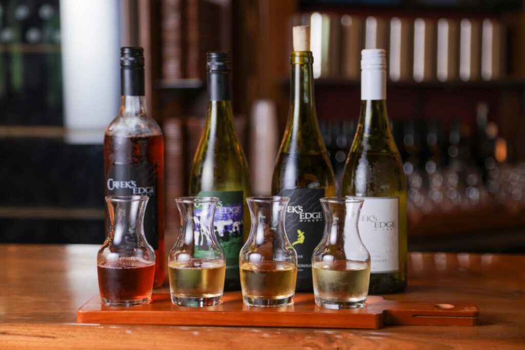 A flight of different types of wine at Creek's Edge Winery.
